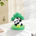 Cute panda resin ornament with green bamboo scene for desktop decor in bright setting - Wealth Panda Stand (1081-13)