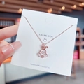 Halskette aus Titanstahl in Roségold mit tanzendem Hasen-Anhänger und Zirkon - Tanzender Hasenstil (X212) / 18K-Gold / Roségold