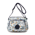 Waterproof nylon crossbody bag with blue floral print and adjustable shoulder strap - Willow Leaf