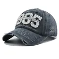 Detailed close-up of 1985 embroidery and distressed denim texture on baseball cap - 54-60cm(Adjustable) / Navy Blue