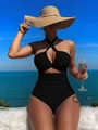 Close-up of black halter neck swimsuit with cross-tie design and high waist cutout detail - S / Black