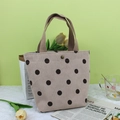 Sac à main en velours côtelé beige à pois noirs et anses marron au style rétro - Point beige