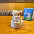 Handcrafted resin cat figurine with fishing rod and yellow fish on a white pedestal - Fishing Cat Series - Ragdoll Cat