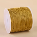 Golden 0.8mm nylon cord for jewelry making on white spool with metallic finish - Khaki/Earth Yellow