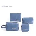 Peacock blue velvet 4-piece makeup bag set with gold embroidery and large capacity - Four-Piece Set / Teal