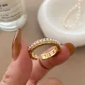 18k gold plated open ring set featuring elegant white pearls and hammered metal texture - Gold Bamboo Pearl