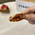 Detailed view of handmade amber acetate hair clip with oval shape and golden text - Approx. 5cm / Caramel color