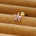 Macro view of gold flower stud earring with purple marquise zirconia and screw back - Gold/Purple Zirconia