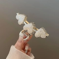 Golden heart-shaped hair claw clip with white pearls for elegant women's hairstyles - Three Hearts Pearl