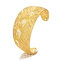 Macro detail of gold open cuff bracelet with intricate openwork filigree floral engraving - Engraved Pattern 2-Radial Geometric
