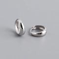 Detail of polished S925 sterling silver hoop earrings with clear hallmark stamp - Inner Diameter 10mm / White Gold