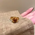 French style vintage gold alloy ring featuring an oval brown tiger eye gemstone - Single Tiger Eye Ring
