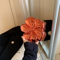 Metallic orange flower-shaped handbag with mirrored finish and gold chain strap - Red