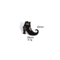 Detail view of gothic witch boot enamel pin with spider web and moon patterns - Witch Boots