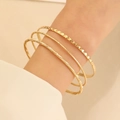 Driedelige goudkleurige minimalistische armbandset met getextureerde gehamerde patronen - Gouden Geometrische Gehamerde 3-delige Set (0117)