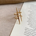 Detail view of double-row vertical gold bar ring on warm camel fabric background - Double Row Vertical Bars / No.8 Ring-Gold