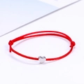 Minimalist red lucky string bracelet with a small polished silver heart charm - Red/Silver