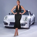 Detail of plunging V-neck halter dress with shimmering rhinestones on black fabric - XS / Black