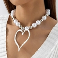Close-up of layered necklace with large pearls and irregular hollow heart pendant on model - Silver (Pearl Silver Bead Mixed Chain Silver Heart)