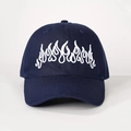 Navy blue baseball cap featuring bold white flame embroidery in a streetwear style - One Size / Navy Blue