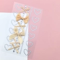 Golden ribbon bow and transparent heart rhinestone DIY decorative stickers for eye makeup - Champagne Bow Jewels (BJA-642)