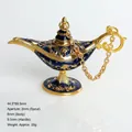 Blue enamel Aladdin magic lamp figurine with golden floral relief on white background - Blue