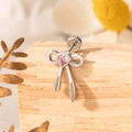 Minimalist silver bow earring with pink heart gemstone on a rustic wooden background - Single Piece / Pink (A324-2#)