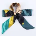 Silky ribbon scarf with yellow and teal geometric patterns tied in a bow - S37-Geometric Color Block
