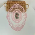 Pink oval embroidered lace placemat with floral details and scalloped mesh edges - Pink