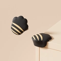 Protezione angolare in silicone nero a forma di zampa con strisce beige per bimbi - Dorso di Zampa di Gatto Nero