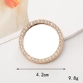 Detail of a 4.2cm round gold makeup mirror with sparkling white rhinestones on the frame - Gold Small Round (4.2cm)