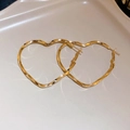 Elegant gold heart-shaped hoop earrings with a textured wavy surface on a ceramic tray - Silver Earring Post Gold Wavy Heart Earrings (41#) / Gold