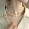 Elegant white irregular freshwater pearl necklace worn on neck in single layer style - White Irregular Pearl Clavicle Necklace (O-f-019)