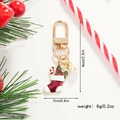 Close-up of a Christmas stocking keychain with pearls and dimensions on a festive background - Christmas Sock