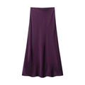 Detailed view of dark purple satin midi skirt fabric with silky texture and drape - Fuschia