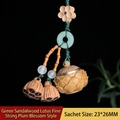 Handcarved green sandalwood lotus pendant with jade ring and woven cord tassel - Approx. 2.3x2.5cm / Green Sandalwood Lotus Thin Rope Plum Style - No Aroma Pill