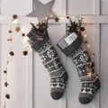 Pair of Nordic knit Christmas stockings with snowflake patterns and pine cone LED lights - Pine Cone Pentagram Battery Style [2m 20 LEDs]