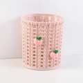 Pink cylinder pen holder with woven texture and cute 3D peach decorations - Peach
