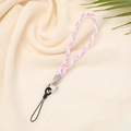Dettaglio del cinturino intrecciato rosa e bianco con chiusura in metallo argentato - Rosa