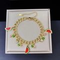 Gold stainless steel bracelet featuring red watermelon enamel charms and pink beads - Watermelon Colorful Bead Gold Bracelet (E2147)
