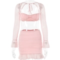Macrodetail van de roze mesh set bestaande uit twee delen met ruches en geplooide stof - S / Roze