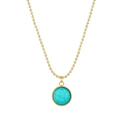 Collana bohémien con perline dorate e ciondolo rotondo in malachite su sfondo bianco - Verde Malachite