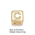 Macro view of 8mm gold letter C bead with micro-pave cubic zirconia for DIY jewelry - Letter C