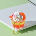 Miniatuur oranje fruit sundae sleutelhanger met witte room en rietje - Rood