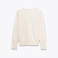 Rear view of white crew neck knit sweater showing ribbed cuffs and hem details - S / Apricot