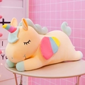 Lying yellow unicorn plush toy with rainbow wings and soft sleeping expression - 30cm (0.15kg) / Yellow