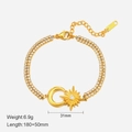 14K gold plated stainless steel bracelet with interlocking sun and moon zircon charms - Gold Moon Star Style
