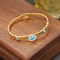 Detailed view of vintage gold snake bracelet with turquoise stones and white zircons - Vintage Turquoise Three Stone Open Style (5#)