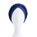 Detail view of the deep blue braided turban hat with soft elastic knit texture - Navy Blue