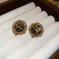 Detailed close-up of vintage gold earrings with leopard print stone and rhinestone halo - Gold Leopard Print Round Vintage Stud Earrings (6#) / Gold